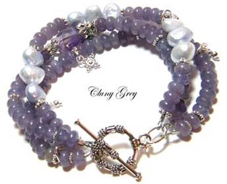 unique handcrafted bracelet with purple pearls and gemstones