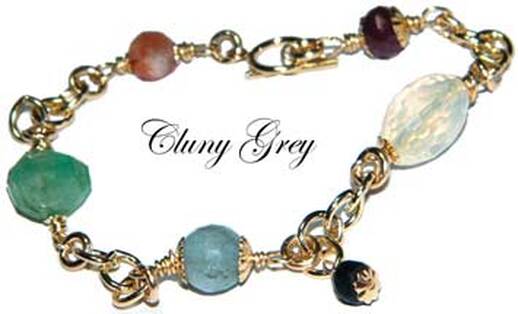 Gold chain bracelet with gemstones