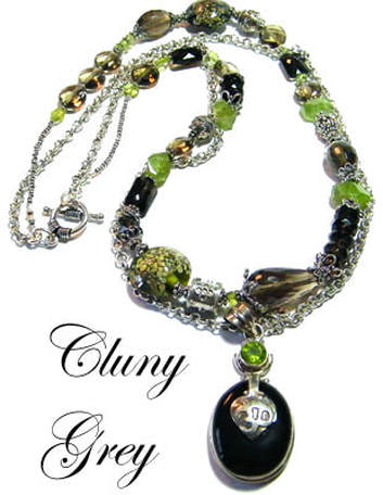 Two strands peridot necklace with lampwork beads, smoky quartz,  teardrops, coins, and rectangles.