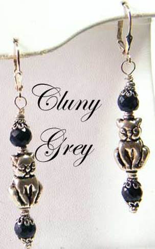 Sapphire earrings with sterling silver cat shaped beads.