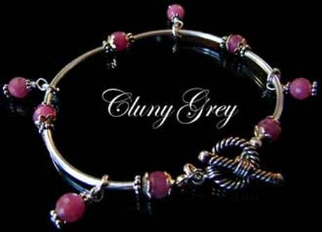 ruby bangle bracelet with charms and sterling silver