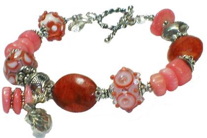 genuine coral bracelet with lampwork and sterling silver
